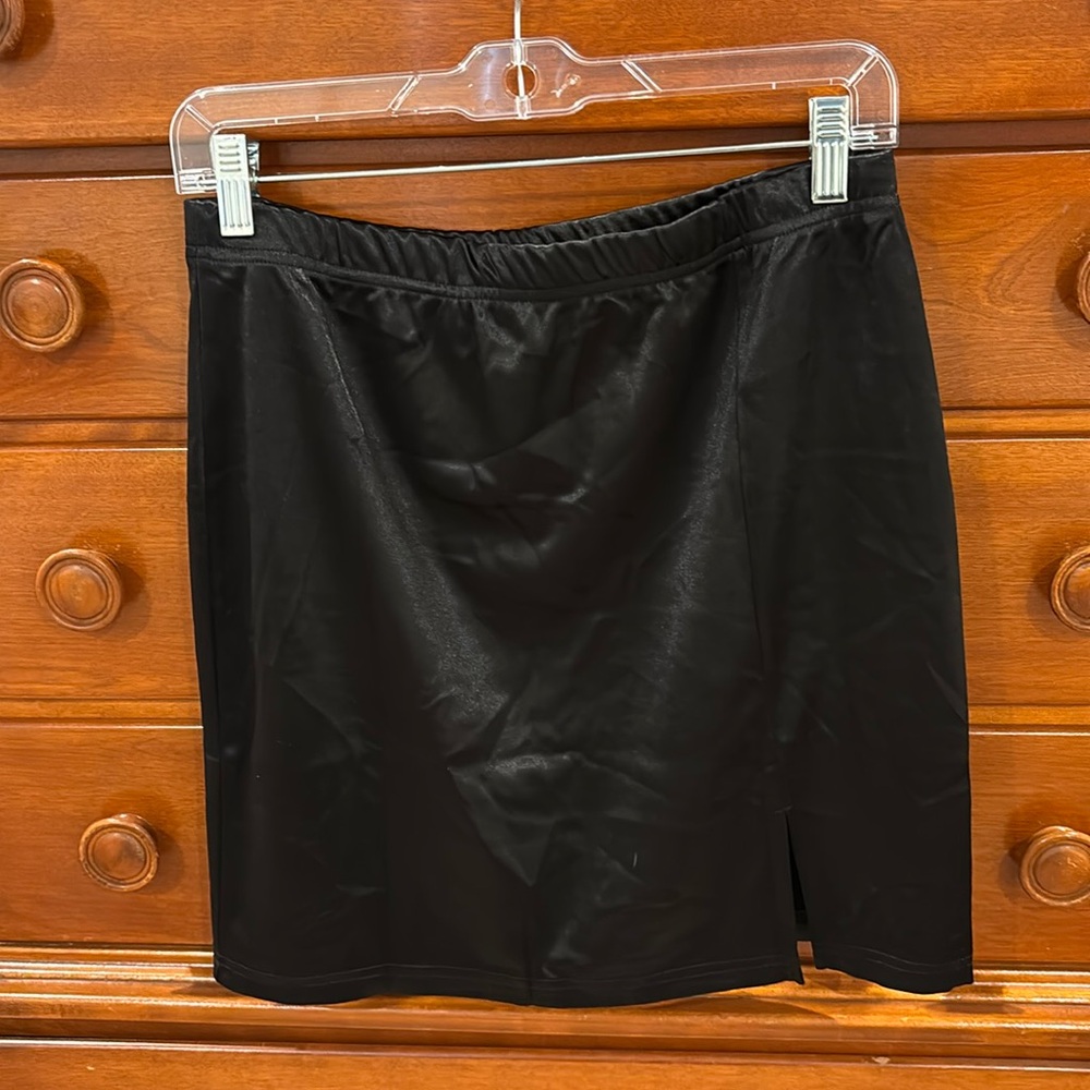 Black stretch satin mini skirt with slit on left leg